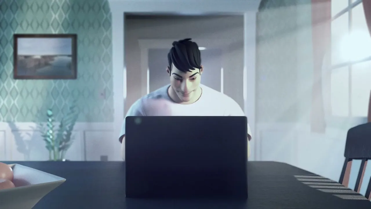Henry at his computer, in daylight